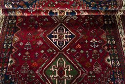 Full view of 2000s Shiraz rug from Iran / Persia, 268 × 168 cm in Red tones