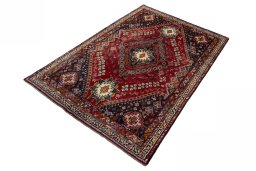 Corner detail of 2000s Shiraz rug showing border pattern and Wool pile