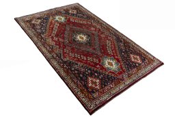 Close-up detail of 2000s Shiraz rug from Iran / Persia showing Wool weave