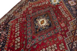 Backside of handmade 2000s Shiraz rug showing knot structure and weave density
