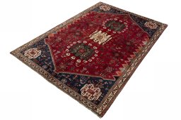 Corner detail of 2000s Shiraz rug showing border pattern and Wool pile