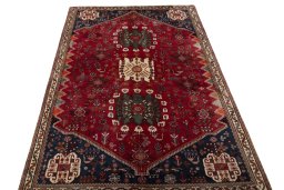 Surface texture of 2000s Shiraz rug with natural Wool and intricate pattern
