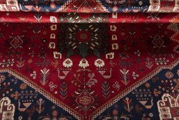 Full view of 2000s Shiraz rug from Iran / Persia, 272 × 176 cm in Red tones