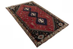 Close-up detail of 2000s Shiraz rug from Iran / Persia showing Wool weave