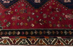 Close-up detail of 2000s Shiraz rug from Iran / Persia showing Wool weave