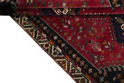 Full view of 2000s Shiraz rug from Iran / Persia, 270 × 178 cm in Red tones