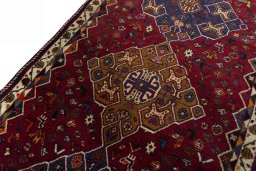 Backside of handmade 2000s Shiraz rug showing knot structure and weave density