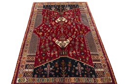 Surface texture of 2000s Shiraz rug with natural Wool and intricate pattern