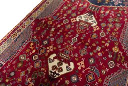 Backside of handmade 2000s Shiraz rug showing knot structure and weave density