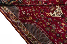 Full view of 2000s Shiraz rug from Iran / Persia, 258 × 166 cm in Red tones