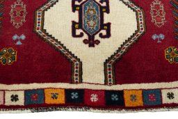 Central medallion detail of 2000s Shiraz rug from Iran / Persia