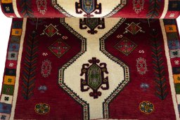 Full view of 2000s Shiraz rug from Iran / Persia, 140 × 78 cm in Red tones