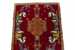 Surface texture of 2000s Shiraz rug with natural Wool and intricate pattern