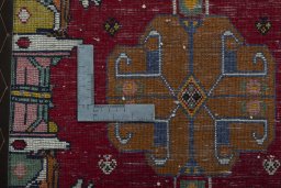 Backside of handmade 2000s Shiraz rug showing knot structure and weave density