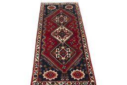 Surface texture of 2000s Shiraz rug with natural Wool and intricate pattern