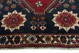 Central medallion detail of 2000s Shiraz rug from Iran / Persia
