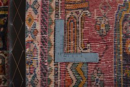 Surface texture of 2000s Shiraz rug with natural Wool and intricate pattern