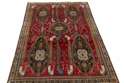 Surface texture of 2000s Shiraz rug with natural Wool and intricate pattern