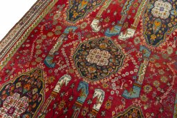 Backside of handmade 2000s Shiraz rug showing knot structure and weave density