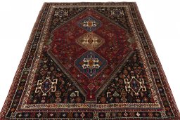 Surface texture of 2000s Shiraz rug with natural Wool and intricate pattern