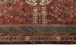 Corner detail of 2000s Shiraz rug showing border pattern and Wool pile
