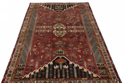 Surface texture of 2000s Shiraz rug with natural Wool and intricate pattern
