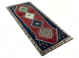Close-up detail of 2000s Shiraz rug from Iran / Persia showing Wool weave