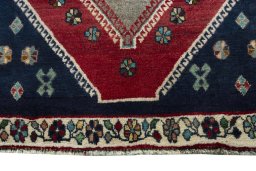Central medallion detail of 2000s Shiraz rug from Iran / Persia