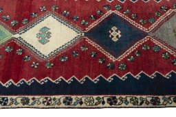 Close-up detail of 2000s Shiraz rug from Iran / Persia showing Wool weave