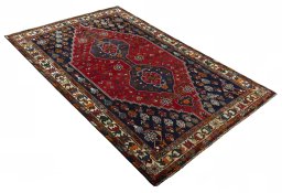 Close-up detail of 2000s Shiraz rug from Iran / Persia showing Wool weave