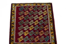 Surface texture of 2000s Shiraz rug with natural Wool and intricate pattern