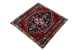 Corner detail of 2000s Shiraz rug showing border pattern and Wool pile