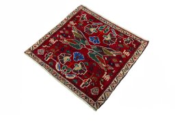 Corner detail of 2000s Shiraz rug showing border pattern and Wool pile
