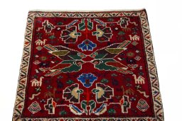 Surface texture of 2000s Shiraz rug with natural Wool and intricate pattern