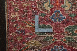 Backside of handmade 2000s Shiraz rug showing knot structure and weave density