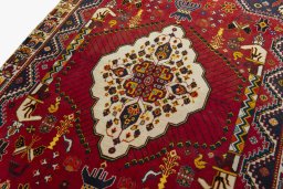 Backside of handmade 2000s Shiraz rug showing knot structure and weave density