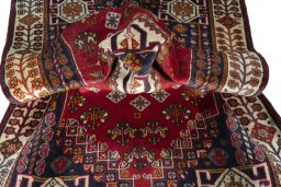Close-up detail of 2000s Shiraz rug from Iran / Persia showing Wool weave