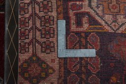 Surface texture of 2000s Shiraz rug with natural Wool and intricate pattern