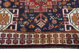 Close-up detail of 2000s Shiraz rug from Iran / Persia showing Wool weave
