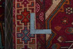 Surface texture of 2000s Shiraz rug with natural Wool and intricate pattern