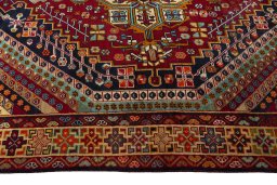 Full view of 2000s Shiraz rug from Iran / Persia, 323 × 184 cm in Multi Color tones