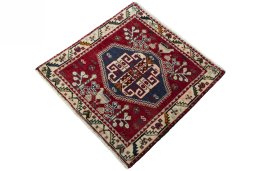 Corner detail of 2000s Shiraz rug showing border pattern and Wool pile