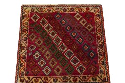 Surface texture of 2000s Shiraz rug with natural Wool and intricate pattern