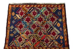 Surface texture of 2000s Shiraz rug with natural Wool and intricate pattern