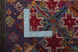 Backside of handmade 2000s Shiraz rug showing knot structure and weave density