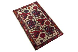 Corner detail of 2000s Shiraz rug showing border pattern and Wool pile