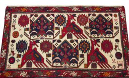 Surface texture of 2000s Shiraz rug with natural Wool and intricate pattern