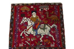 Surface texture of 2000s Shiraz rug with natural Wool and intricate pattern