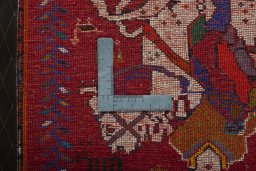 Backside of handmade 2000s Shiraz rug showing knot structure and weave density