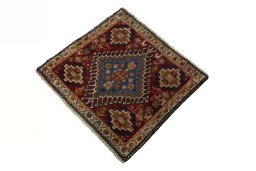 Corner detail of 2000s Shiraz rug showing border pattern and Wool pile